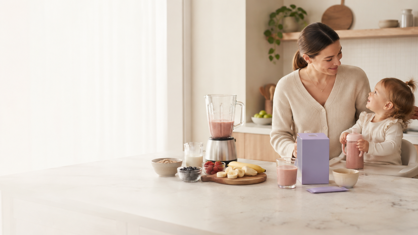 Mum and toddler in a bright kitchen with homemade smoothie ingredients, a blender and toddler smoothie preparation for a family nutrition routine.