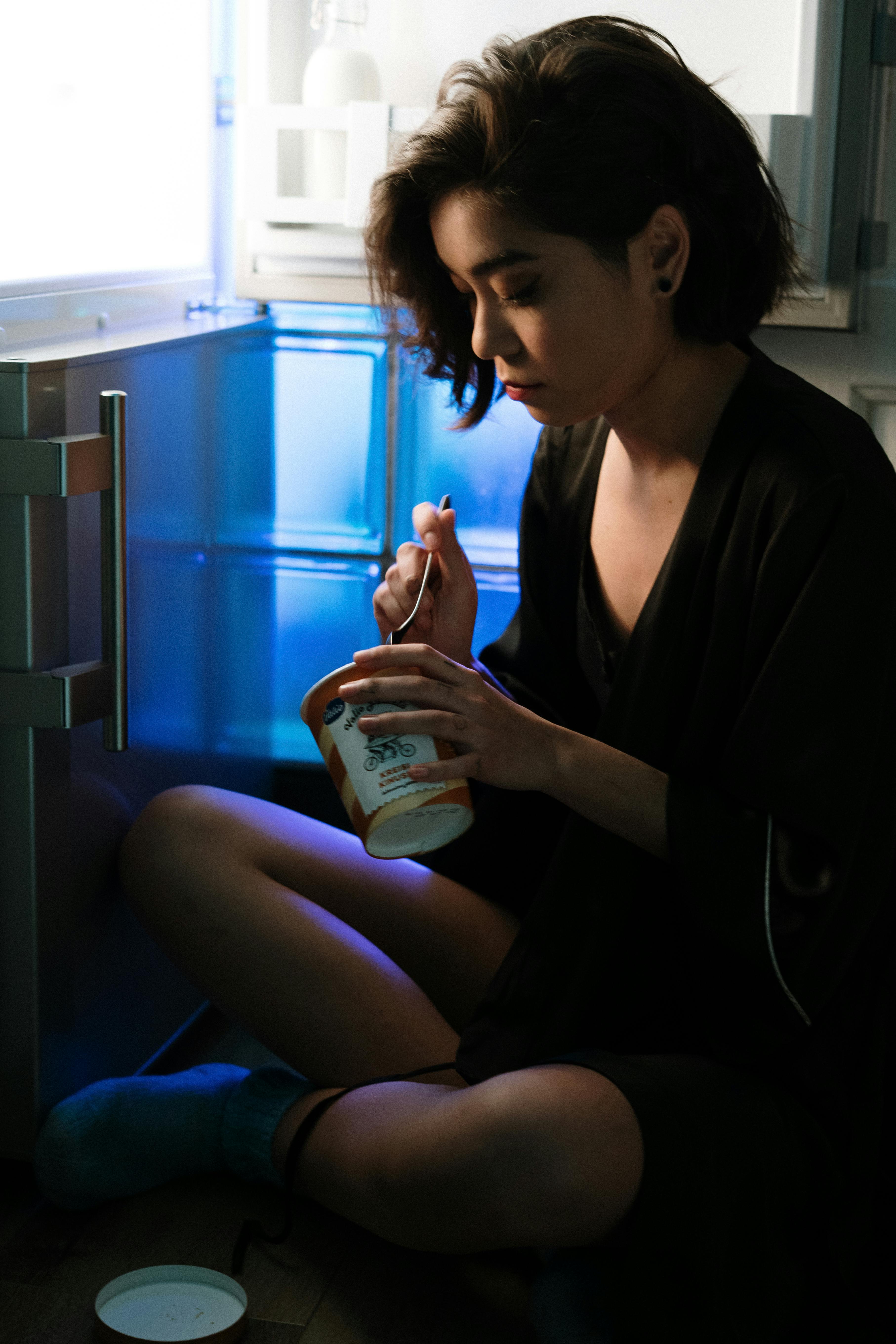 Pregnant woman enjoying a healthy yoghurt